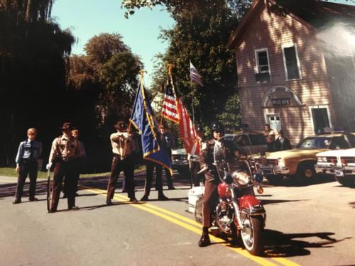 Community Day Parade 1976. On Motorcycle – Ofc. Skip Daly, Color Guard from left to right – Ofc. Victor DeCapua, Ofc. Steve Freddo, Ofc. Brian Smith, Ofc. Edward McCann 