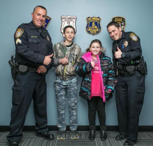 Sgt. Jeff Chant (left) and Ofc. Tamrah Briody Shop With A Cop ’16 